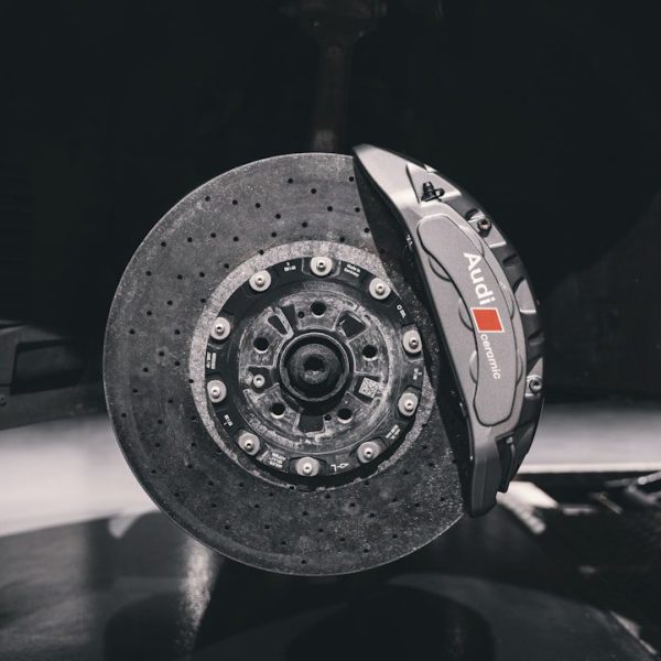 Expert tyre technician at work - brake repairs in Sydney